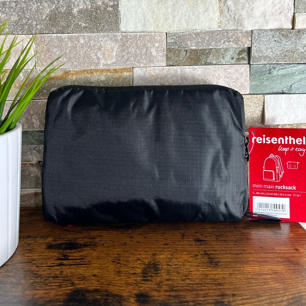 Reusable Portable Black Travel Backpack with built in carrying pouch